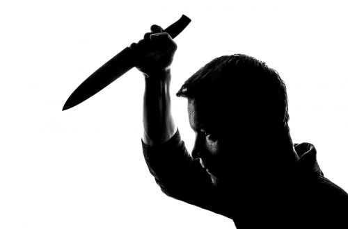 Silhouette with knife